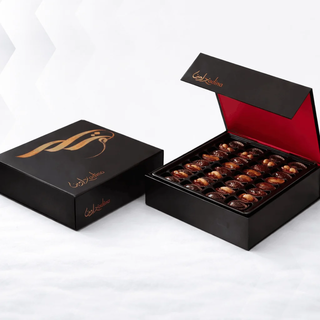 Board gift box with a mounted card pocket beside a lined date tray